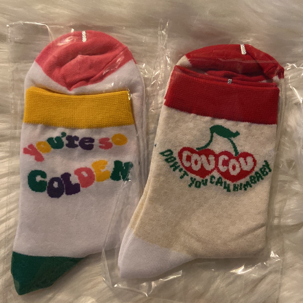 Pair Of Raccoon Brand Socks
